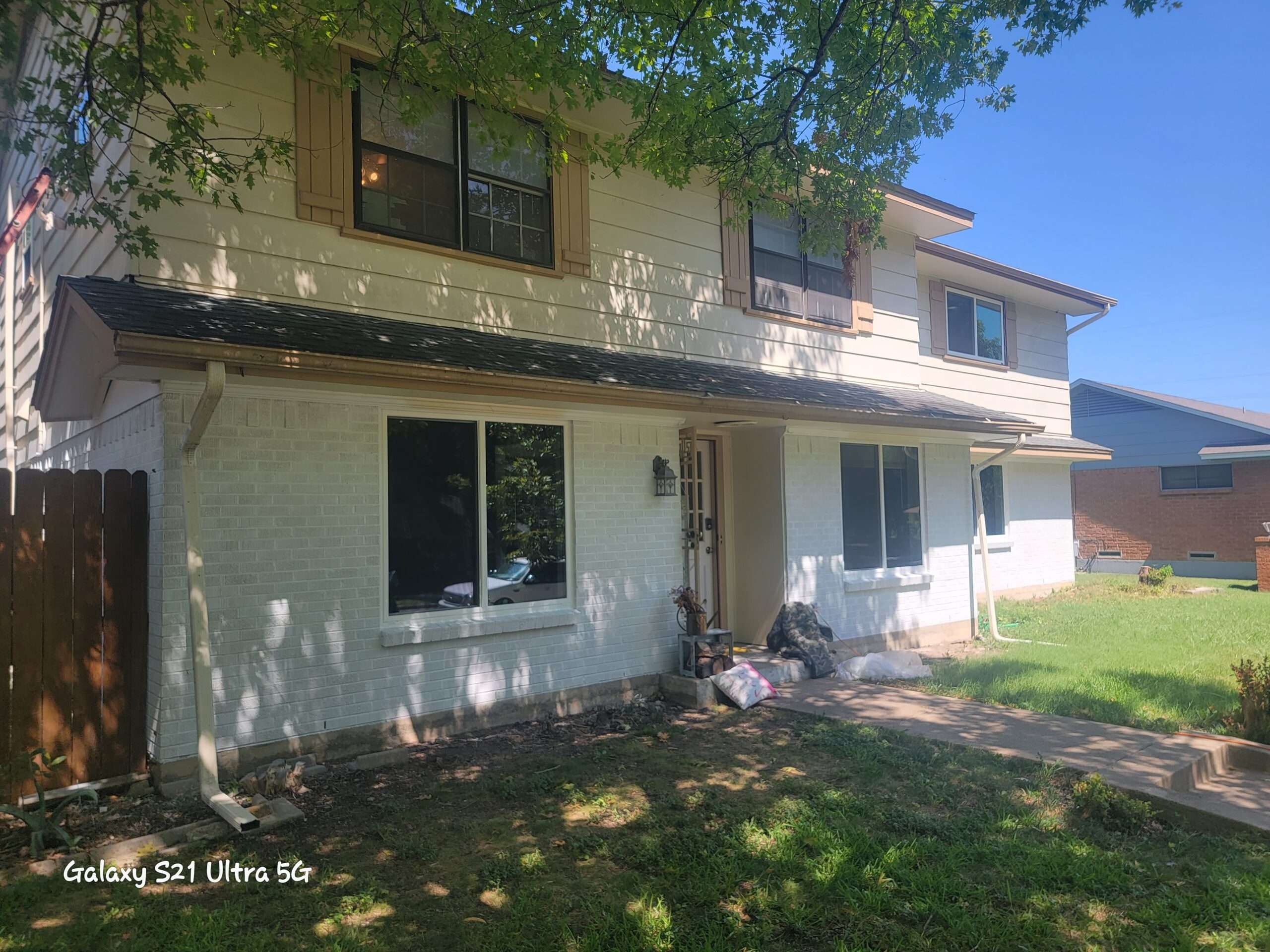 This is a home in Duncanville Texas that is in need of siding and window replacement.