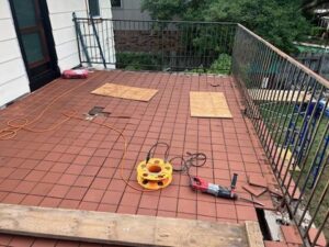 Old and unsafe decking material from tile.