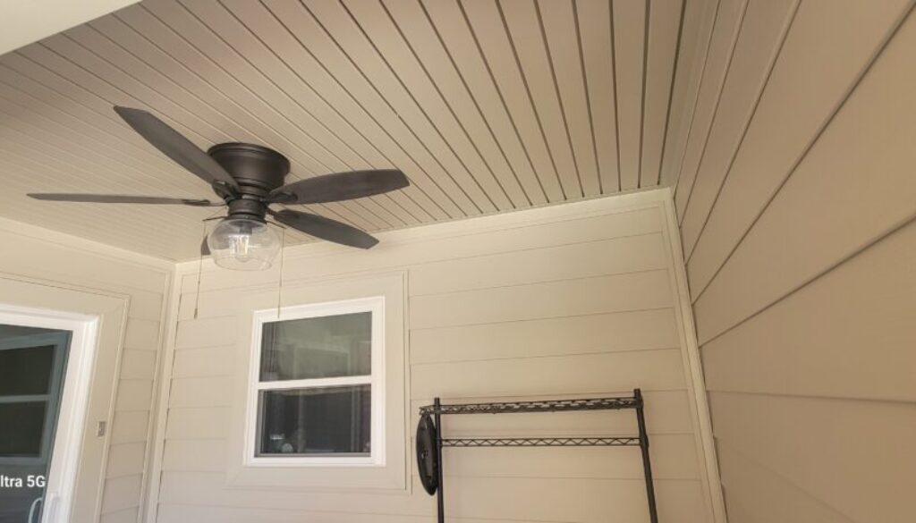 Ascend composite siding on a back porch with matching soffit, fascia and aluminum capping