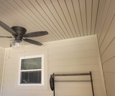 Ascend composite siding on a back porch with matching soffit, fascia and aluminum capping
